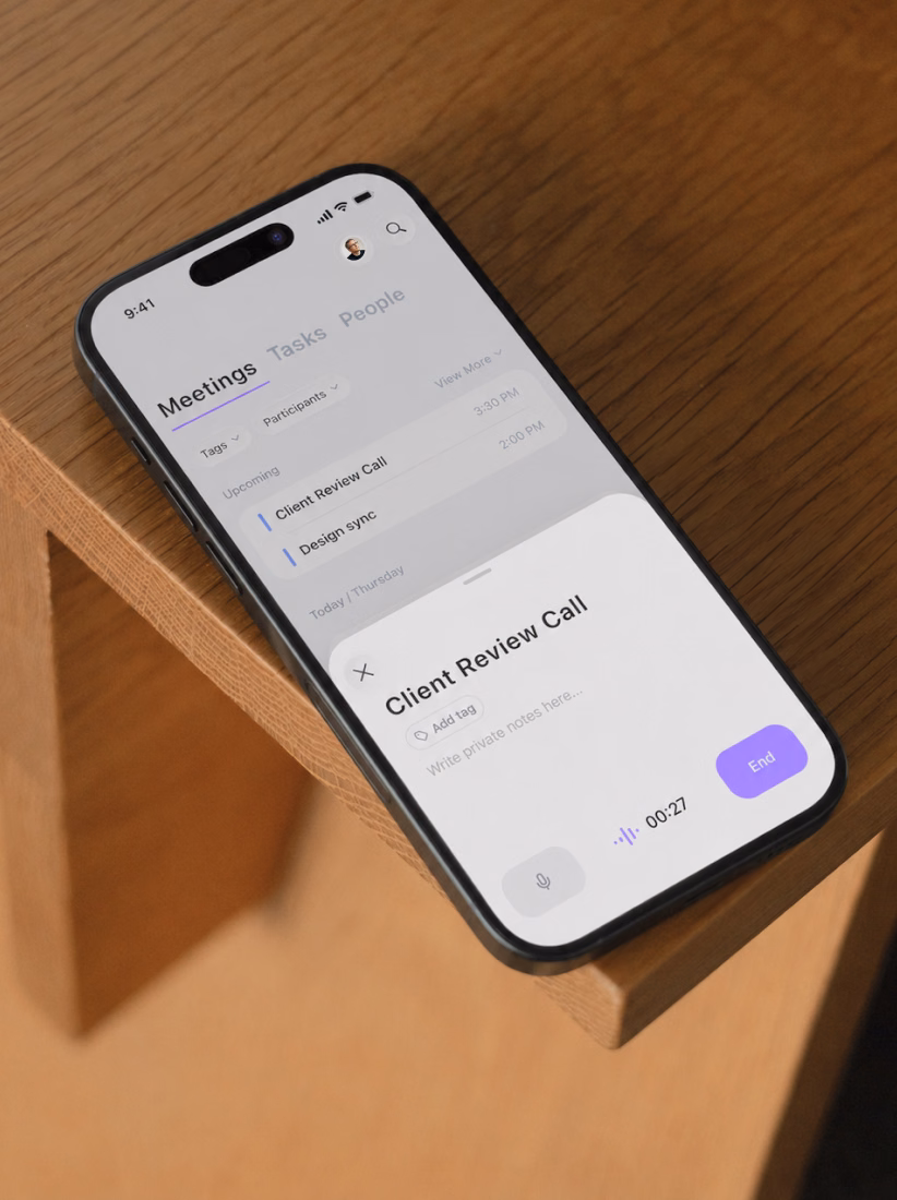 Jamie recording a client review call on an iPhone